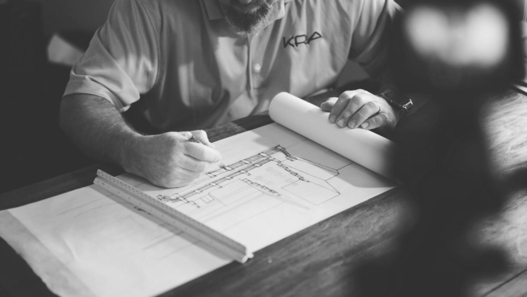 Financial analysis workspace with charts, calculators and planning documents